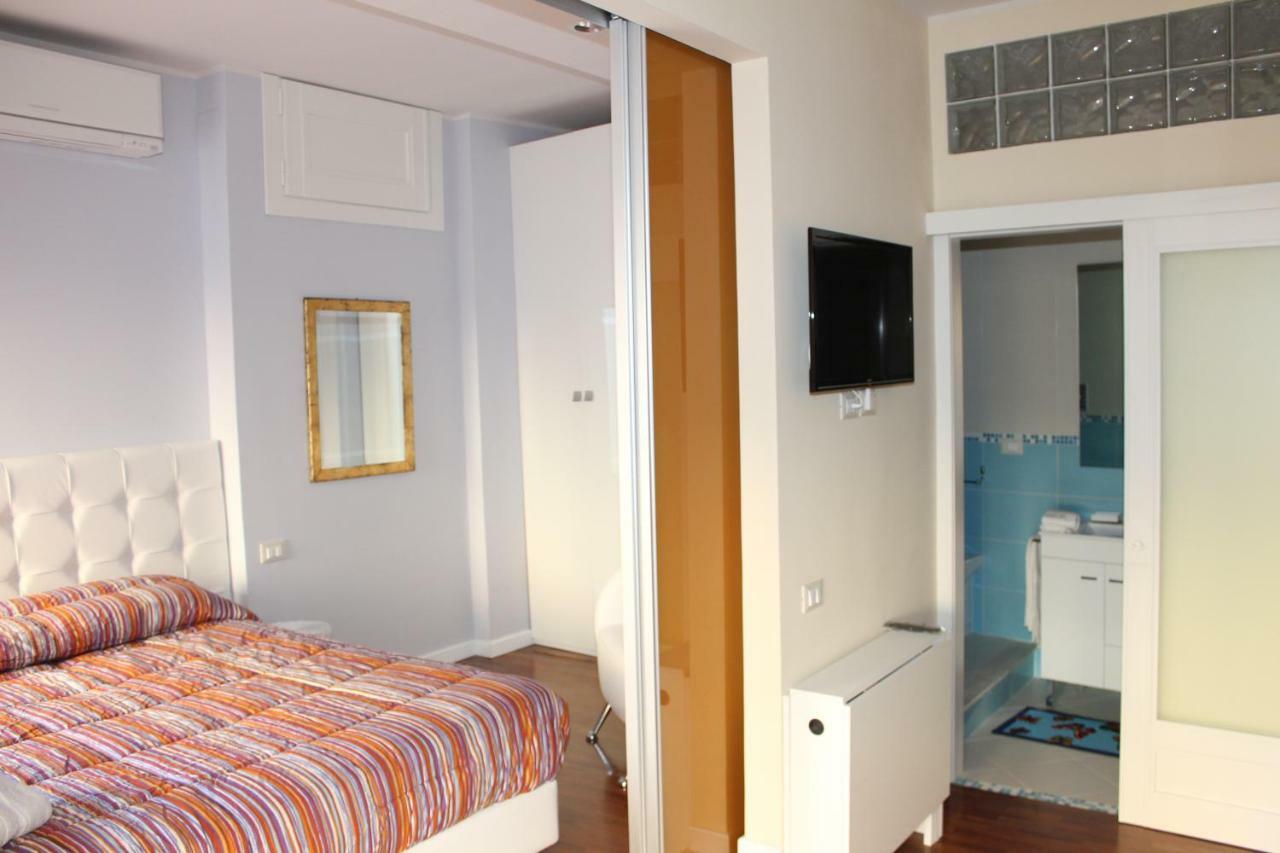 Domus Yenne Suites Cagliari Bagian luar foto